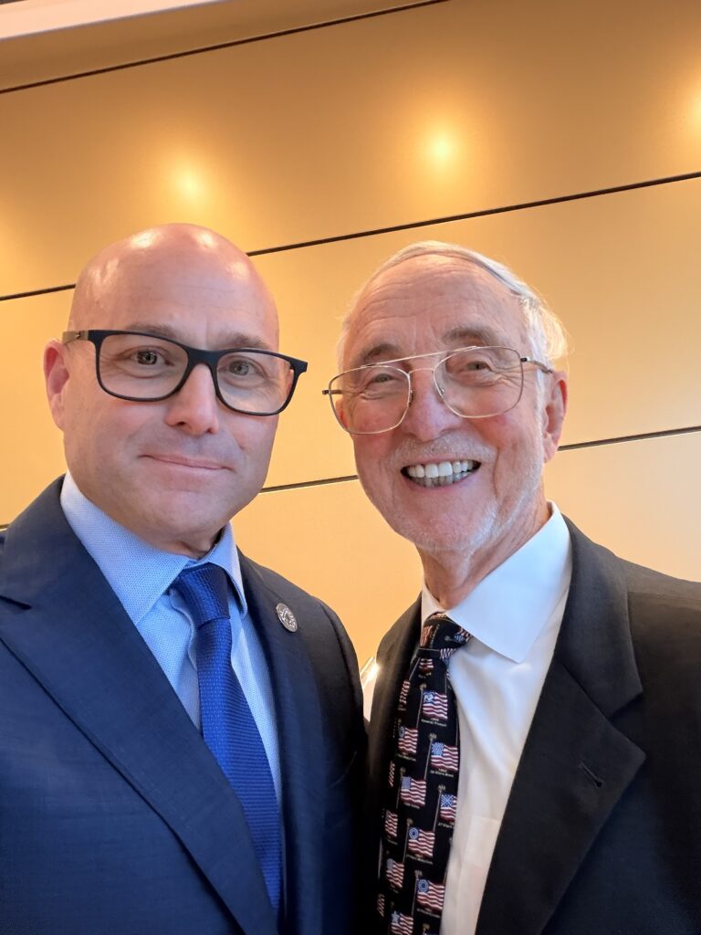 Chris Grollnek Active Shooter Prevention Project LLC with Gordon R England 72nd and 73rd Secretary of the Navy former Deputy Secretary of Defense Celebrate America 250 National Medal of Honor Museum Arlington Texas April 2026 PRO Model NEVERHERE aspppro.com