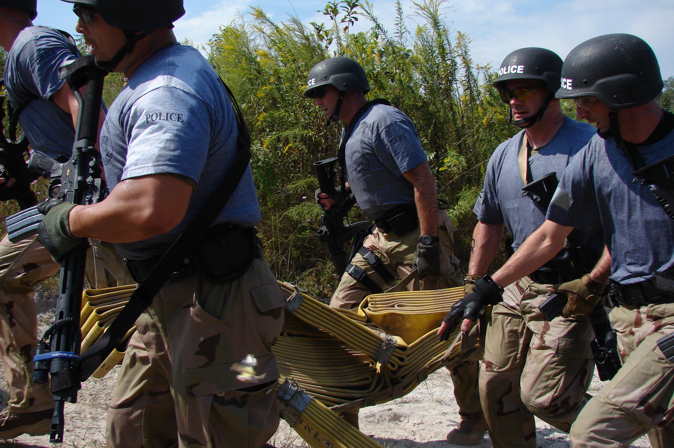 SWAT law enforcement officers tactical helmets police training active shooter response active shooter prevention Chris Grollnek Active Shooter Prevention Project LLC aspppro.com history cannot be ignored PRO Model #NEVERHERE