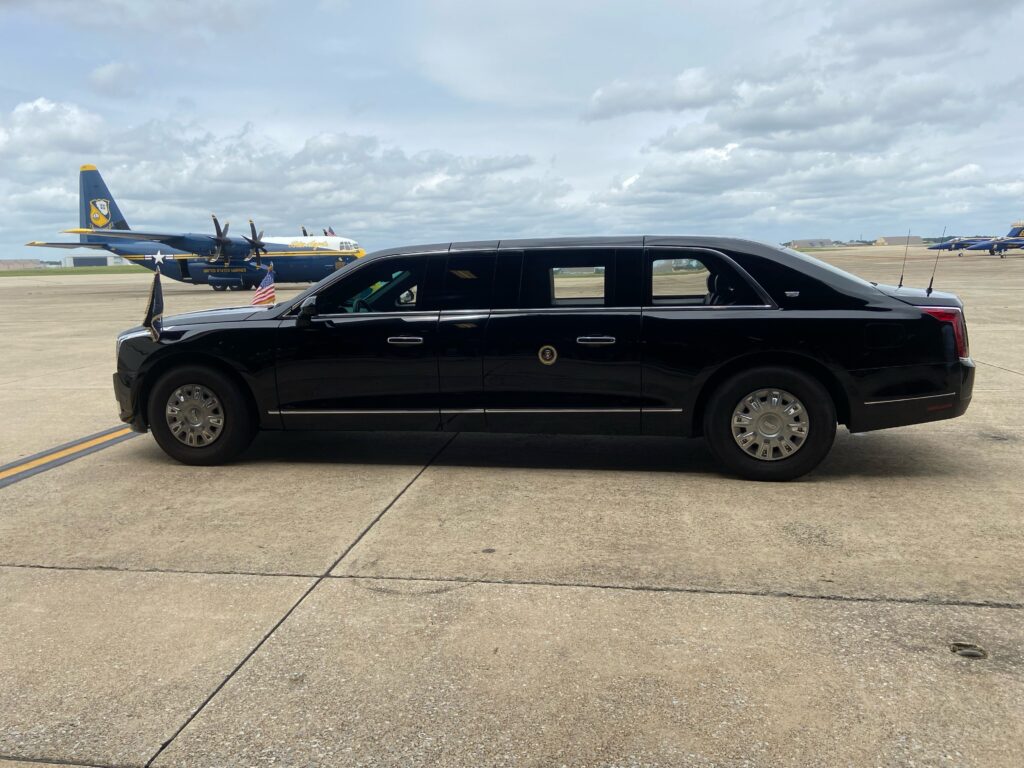 Presidential State Car staged on the flight line alongside U.S. Navy Blue Angels and U.S. Marines Fat Albert C-130J during an Active Shooter Prevention Project pre-visit assessment
