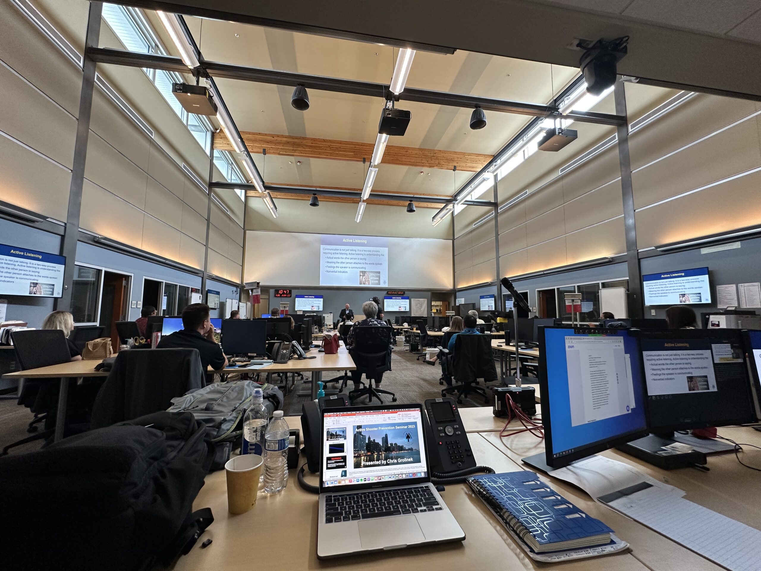 Active Shooter Prevention Project post-assessment briefing to municipal and court leadership inside a Washington State Emergency Operations Center ahead of a high-profile police-accountability trial